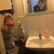 Mckyla showing how small the bathrooms were at Karkku